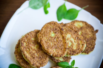 vegetable fritters made from green zucchini in a plate
