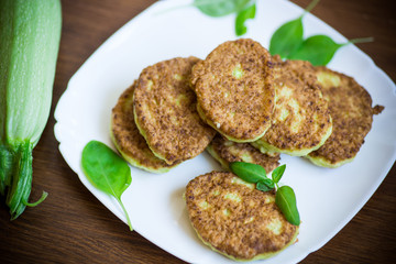 vegetable fritters made from green zucchini in a plate