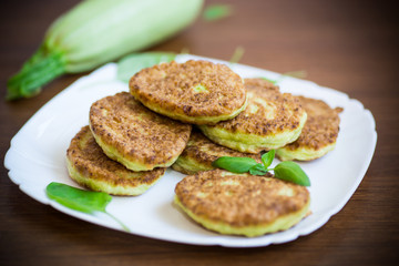 vegetable fritters made from green zucchini in a plate