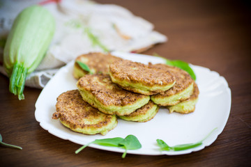 vegetable fritters made from green zucchini in a plate