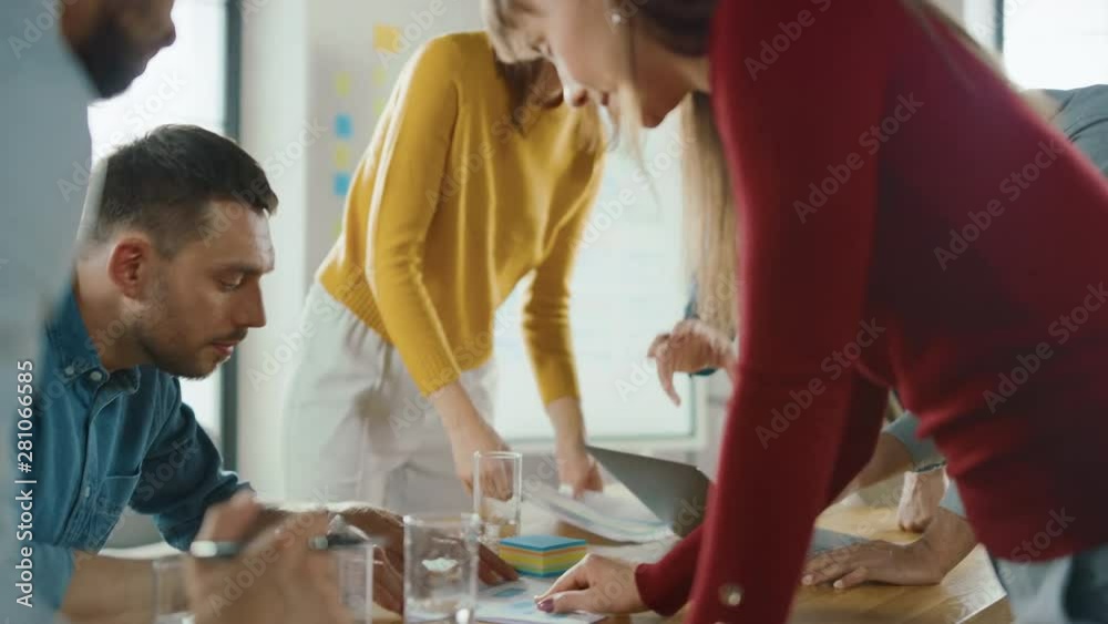Poster startup meeting room: team of entrepreneurs gather around conference table have discussions, solve p