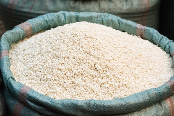 Bag full of white rice on the asian market