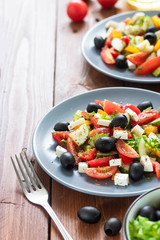 Greek salad with fresh tomatoes, peppers and cucumbers