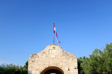 Historical town gate in small town Nin, Croatia.
