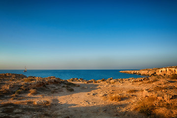 Beautiful seascape with a stone, rocky shore.