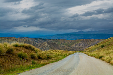 Scenic small mountain road with beautiful views between villages in eastern part of Sicily island, Italy