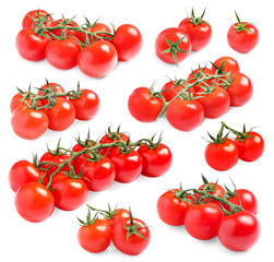 Branch of fresh cherry tomatoes isolated on white