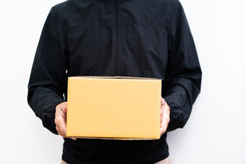 Unrecognize man holding parcel box