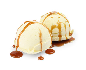 Delicious ice cream with caramel sauce on white background