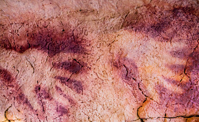 Red hands silhouette of the cave of the Salin Fountain, Cantabria, Spain