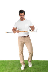 Young man posing with golf club on white background