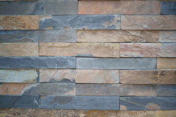 texture Background of Natural granite stone wall made with blocks close up