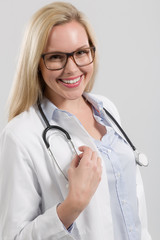   young smiling doctor with stethoscope and in lab coat