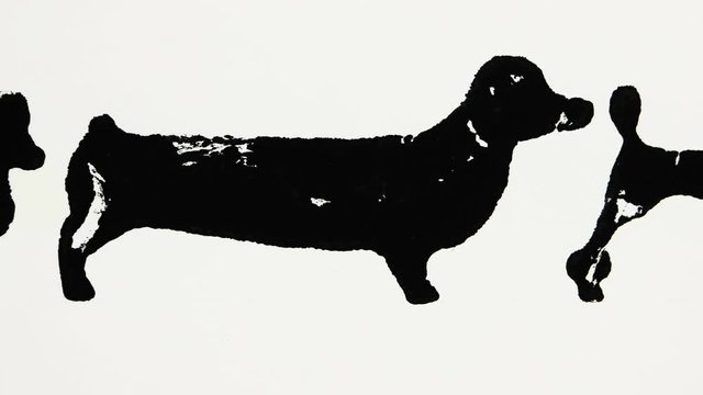 Black silhouettes of dachshund and poodle on the white background, graphic arts