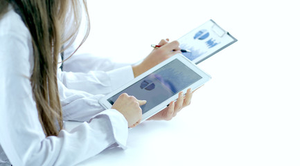 close-up of employees working with financial schedules