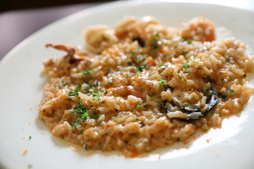 Seafood Risotto , traditional italian rice on table