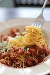 Spaghetti white sauce (Spaghetti Carbonara) with bacon and garlic , on wood table background