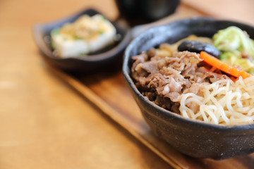 Sukiyaki donburi , sukiyaki hot pot stew with Japanese rice in bowl Japanese food