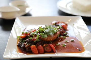 Fried fish with spicy sauce and rice , traditional thai food