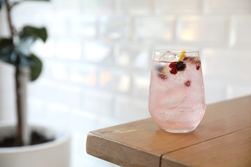 Lemonade or mojito cocktail with lemon and mint, cold refreshing drink or beverage with ice