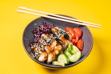 eel with fresh vegetables on the yellow backgound