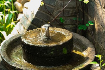 Water spout on stone mill