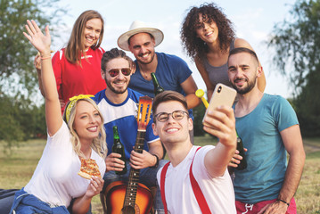 Group of friends making a selfie together
