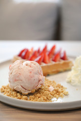 Strawberry waffle with ice cream , dessert on wood background