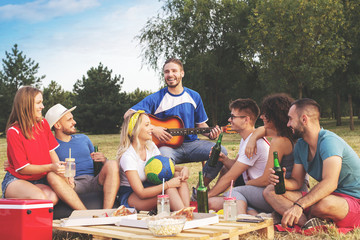 Young friends enjoy in party at the park