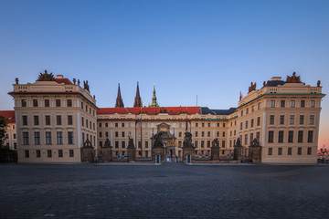 Entrance with forecourt to Prague Castle from Hradschin Square. Historic building with fence and...