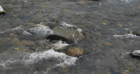 River lake stream over the pebble stone