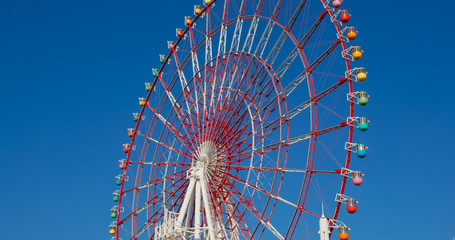 Ferris wheel with clear blue sky