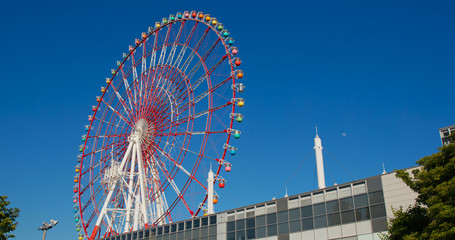 Ferris wheel with blue sky