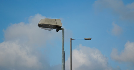 Fototapeta na wymiar Street lamp pole with blue sky