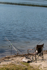 Fototapeta na wymiar fishing rods are on the beach