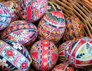 Wooden and painted Easter eggs of various colors, typical Romanian souvenirs