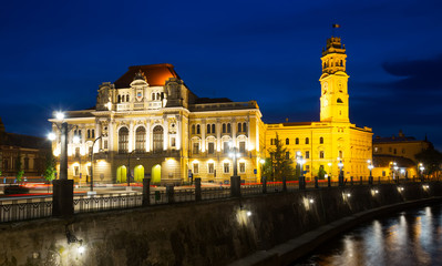 Fototapeta na wymiar Oradea City Hall and river Crisul Repede in night