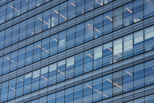 Modern facade with glass wall in windows