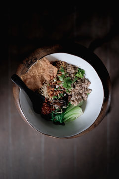 Singaporean style dry egg noodles with pork
