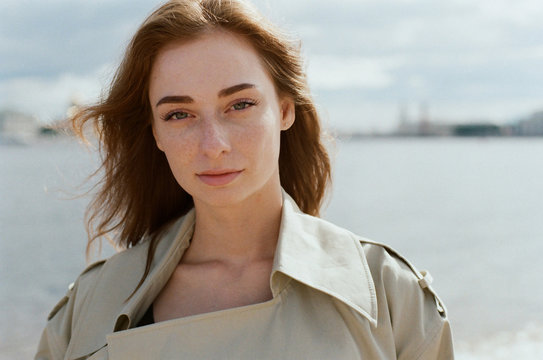 Portrait of young woman with flying hair