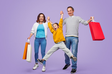 Happy family having fun during shopping