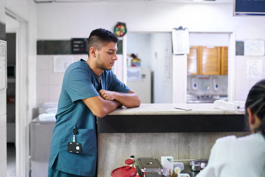 Hospital professional at nurse station
