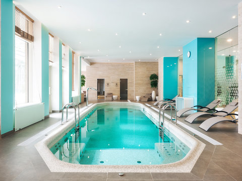 Modern pool with loungers