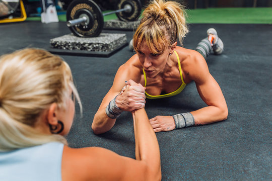 Arm wrestling challenge between women