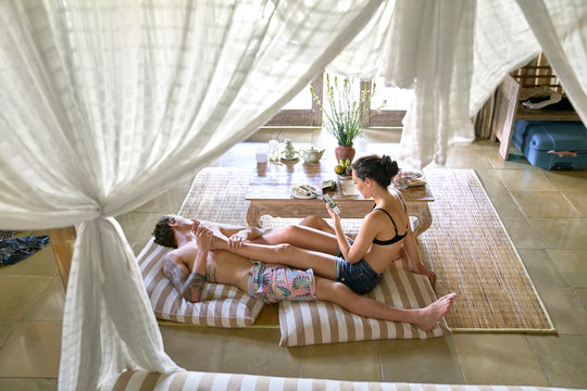 Young couple relaxing at home