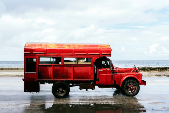 Vintage cuban truck riding on road