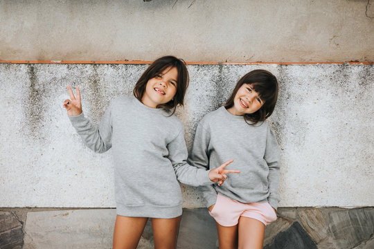 Portrait of two little sisters
