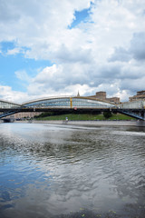 The view of Bogdan Khmelnitsky pedestrian bridge across Moskva river from the Berezhkovskaya embankment