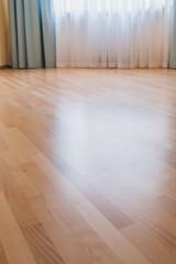 View of the parquet floor with natural light - natural flooring