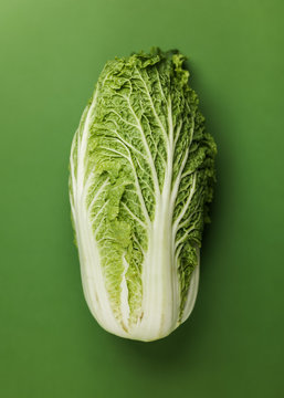 Fresh ripe cabbage on green